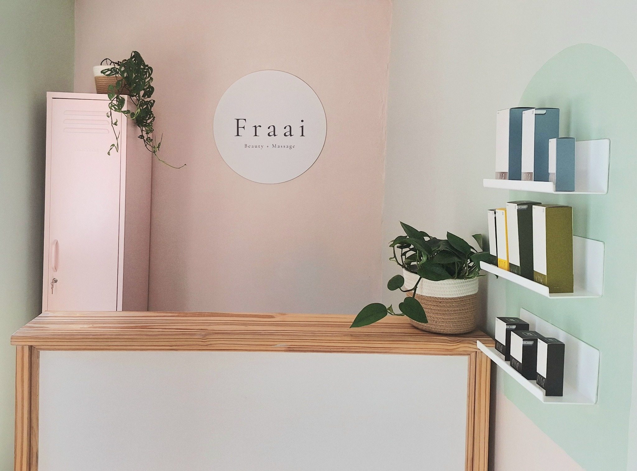 Fraai reception area in soft pink and sage